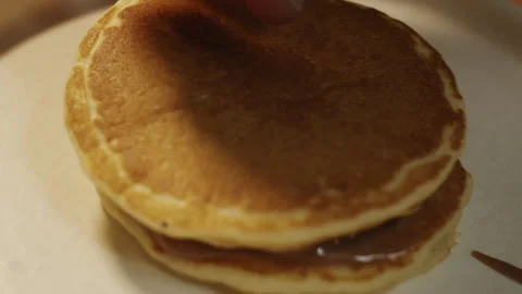 The hands of the chef put the cooked pancake on the chocolate cream 스톡 동영상 151361719