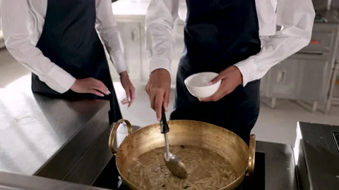 Hands of chef students trainee cooking chineses food soup, chef with white .. Stock Footage 245148826