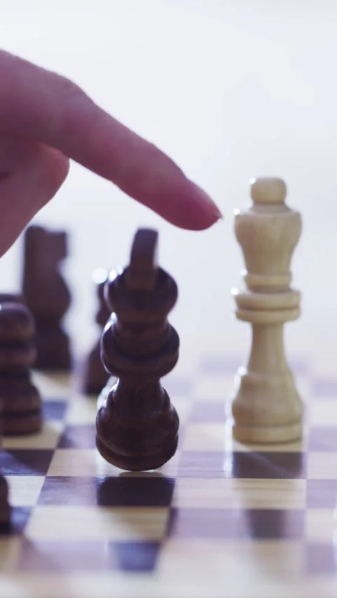 Hands, chess and checkmate with game, piece and eliminate king with strategy, Stock Footage 329746363