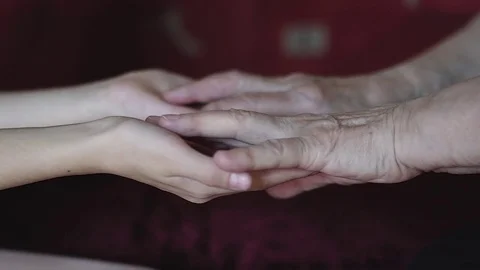 Hands of child and hands of an elder woman Stock Footage 75757954