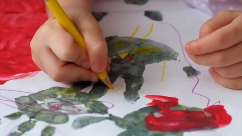 Hands of a child draw handles Stock Footage 86109016