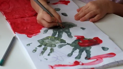 Hands of a child draw handles Stock Footage 86109029