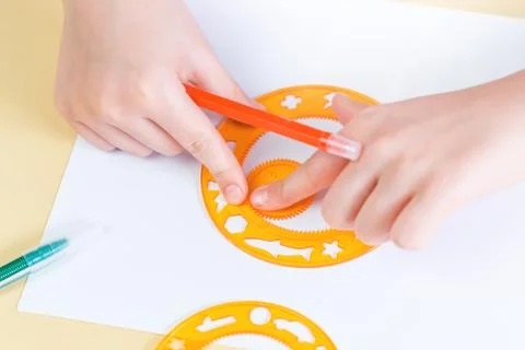 Hands of a child drawing Stock Photos