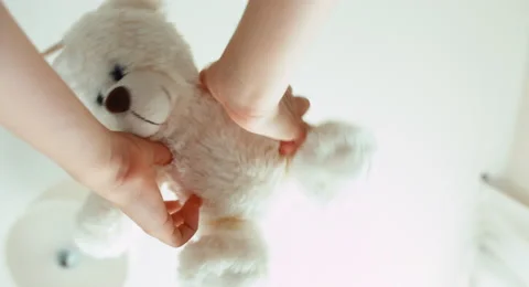 Hands of the child playing with teddy bear Stock Footage 53090010