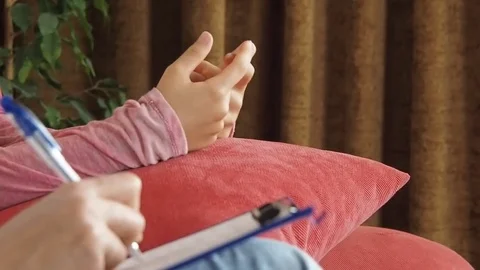 Hands of a child with a psychologist. Stock Footage 78610357