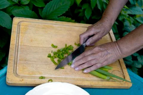 Hands Chopping Onion Photos