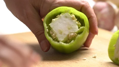 Hands chopping a sweet green pepper Video stock 109122201