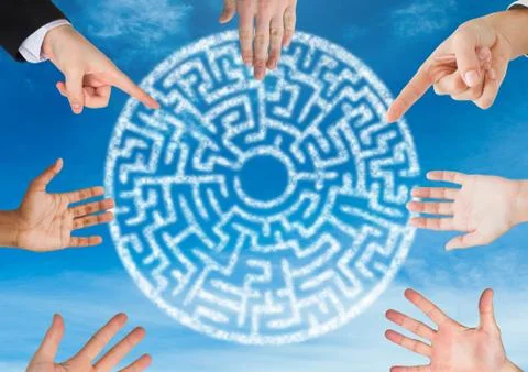 Hands in circle around cryptic maze circle in sky Foto stock