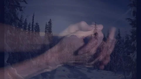 Hands clapping animation over snowy forest landscape with tall trees Stock Footage 329972347