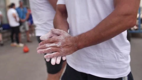 Hands clapping chalk powder Stock Footage 249084373