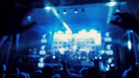 Hands clapping at outdoor summer night rock concert in crowd of people Stock Footage 120246942
