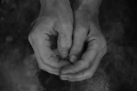 Hands clasped together. Stock Photos