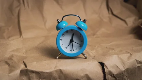 Hands of the Classic Alarm Clock Count the Time Stock Footage 243742204