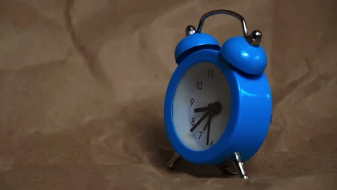 Hands of the Classic Alarm Clock Count the Time Stock Footage 243757843