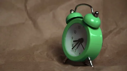 Hands of the Classic Alarm Clock Count the Time Stock Footage 244976985