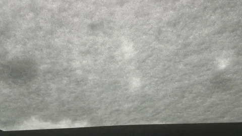 Hands clean snow from the glass machine Stock Footage 83466869