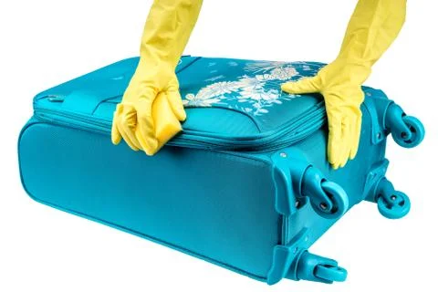Hands clean suitcase Stock Photos