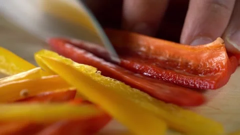 Hands close up cutting peppers Stock Footage 132602334