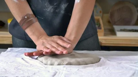 Hands of a close-up sculptor working in a workshop Stock Photos