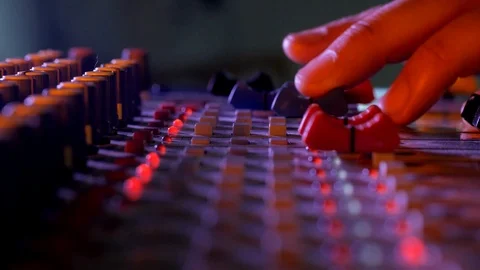 Hands close-up of sound control panel with knobs neon light at music recording 스톡 동영상 90626903