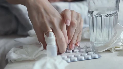 Hands close-up take the pills out of the package Video stock 152290433
