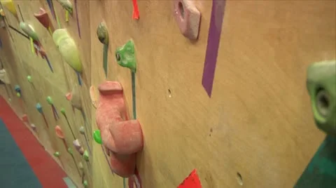 Hands close up while indoor rock climbing Stock Footage 19771198