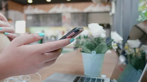 Hands close up woman using smartphone with online shopping and drinking coffee Video stock 152830552