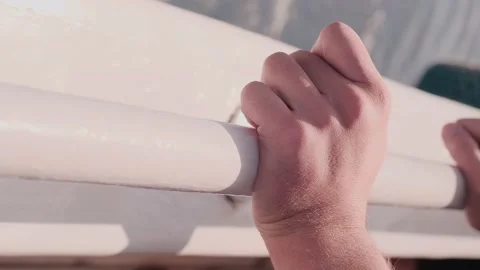 Hands close-up on the yacht Stock Footage 234418847