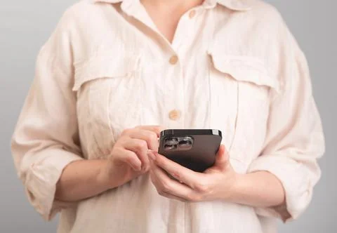 Hands closeup using mobile phone, smartphone Stock Photos