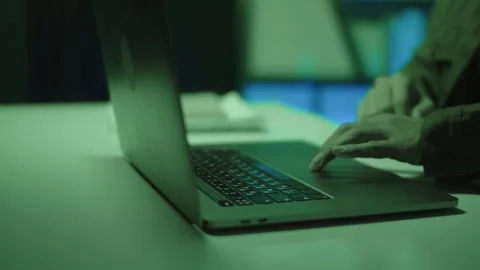 Hands of Coder Using Laptop while Working Late to Meet Deadline Stock Footage 256981431