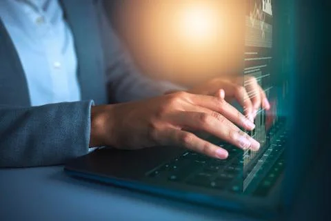 Hands, coding and laptop at night for online, research and web development in 写真素材