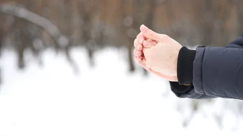 Hands in cold white winter Stock Footage 98736943