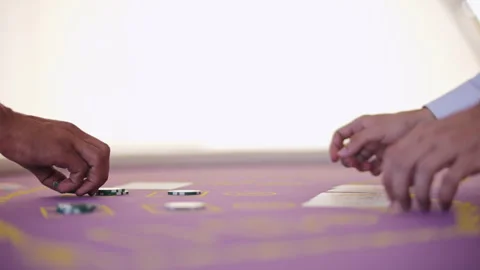 Hands collecting chips from casino table Stock Footage 317563567
