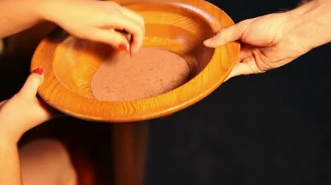 Hands coming in to give offering. Stock-Footage 10731650