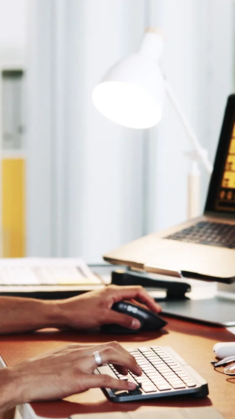 Hands, computer and typing with celebration at startup, goals and fist pump in Stock Footage 333243726