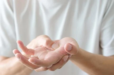 Hands of computer users have pain and injury to the fingers. From Syndrome Sy Stock Photos