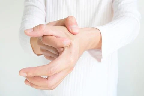 Hands of computer users have pain and injury to the fingers. From Syndrome .. Stock Photos