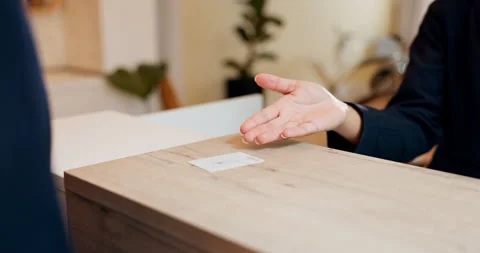 Hands, concierge and welcome with card at hotel, discussion and business trip Stock Footage 297163928