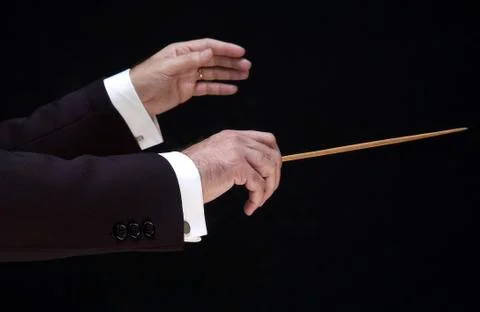 Hands of the conductor 库存照片