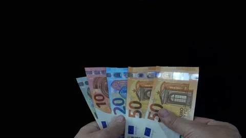 Hands consider different Euro banknotes in 4K Stock Footage 159638516