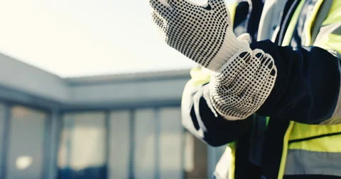 Hands, construction worker and gloves at site for safety, injury prevention or Stock Footage 345582461