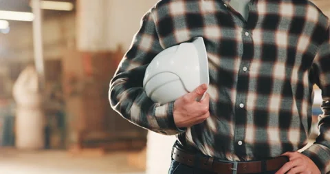 Hands, contractor and man with helmet for carpentry, safety compliance and Stock Footage 341305537
