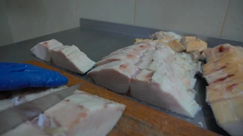 The hands of the cook cut the fish Stock Footage 148463902