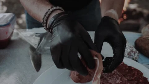 Hands of the cook in gloves put meat products on a plate with cheese sausage Stock Footage 131247858