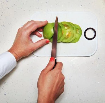 Hands of cook Stock Photos