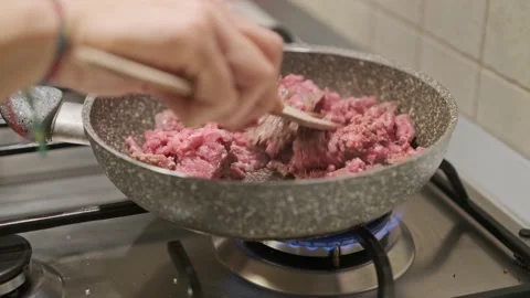 Hands Cooking Delicious Minced Beef Meat on Pan Close Up Stock Footage 144948702