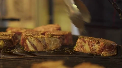 Hands cooking grilled meat Stock Footage 86511344