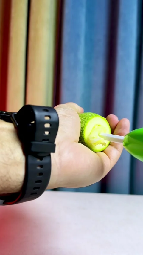 Hands Coring Zucchini With Plastic Tool Vídeo Stock 343006977