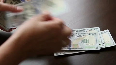 Hands count dollars and give it to another person, close-up. Exchange of se.. Stock Footage 266473803