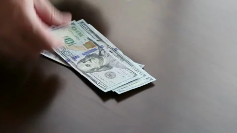 Hands count dollars and give it to another person, close-up. Exchange of se.. Stock Footage 266473810